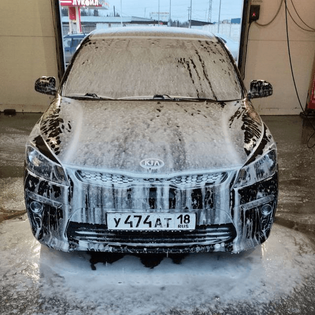 Автомобиль такси после мойки KIA